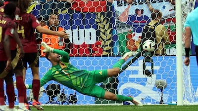 BELGIUM RATINGS: No save to make until just after half-time when he got down well to block deflected Tchouameni effort with France only managing two shots on target despite all their chances. No chance with winner due to big deflection. EPA