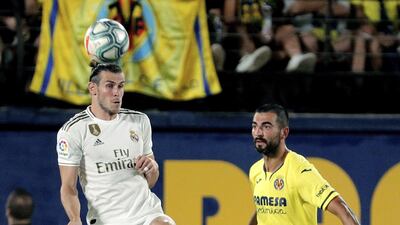 Villarreal's Raul Albiol (R) in action against Real Madrid's Gareth Bale (L) during a Spanish LaLiga soccer match between Villarreal and Real Madrid at the Ceramica stadium in Villarreal, eastern Spain. EPA