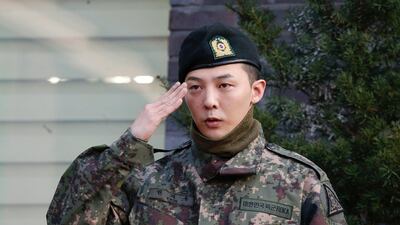 Leader of South Korean K-pop boyband Big Bang G-Dragon leaves after being discharged from army in Yongin, South Korea, October 26, 2019. REUTERS/Heo Ran