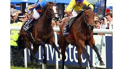 Sea The Stars, right, ridden by Mick Kinane, wins the Derby at Epsom in June.