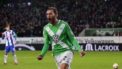 Wolfsburg's Bas Dost celebrates after scoring the team's second goal during their Bundesliga win over Hertha Berlin on Sunday. Ronny Hartmann / AFP / February 22, 2015