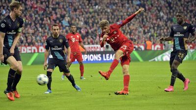 Bayern Munich’s Thomas Muller shoots and scores his side’s second goal against Arsenal on Wednesdya night in their Champions League match at the Allianz Arena. Kerstin Joensson / AP