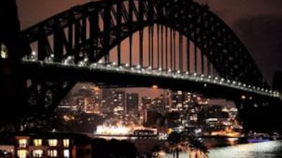 The Sydney Harbour Bridge, with lights off as part of Earth Hour.
