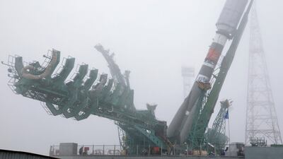 The Russian rocket scheduled to take OneWeb satellites into space is lifted to a launch pad at the Baikonur Cosmodrome in Kazakhstan. Photo: Reuters