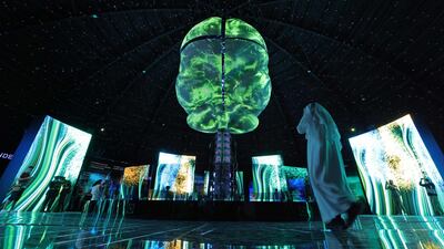 Visitors take pictures inside the Russia pavilion. AFP