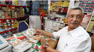 Shabbir Rokadia stocks wrist bands, pins, badges and flags for India's Independence Day.