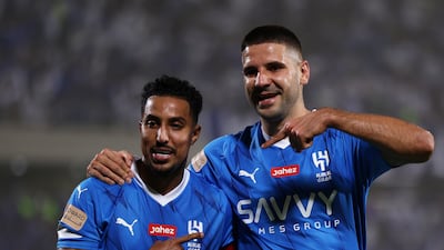 Al Hilal combine expensive foreign talent such as Aleksandar Mitrovic, right, with elite homegrown players like Salem Al Dawsari, left. Getty Images