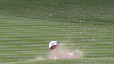 Connor Syme of Scotland plays a shot during round two of the Dubai Desert Classic at Emirates Golf Club. Karim Sahib / AFP Photo