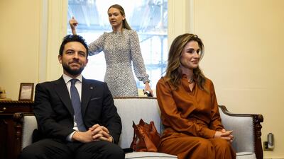 Prince Hussein and Queen Rania attend a meeting. Getty / AFP