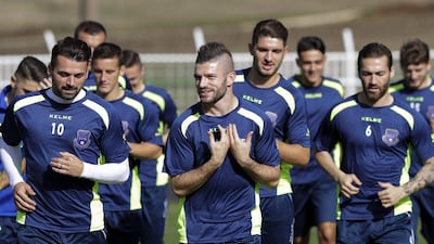 Valon Berisha, centre, scored Kosovo's first competitive goal in the 1-1 draw against Finland in the previous 2018 World Cup qualifier. Valdrin Xhemaj / EPA
