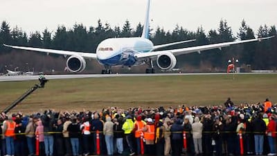 Boeing's 787 Dreamliner taxies down the runway before its maiden flight last year.