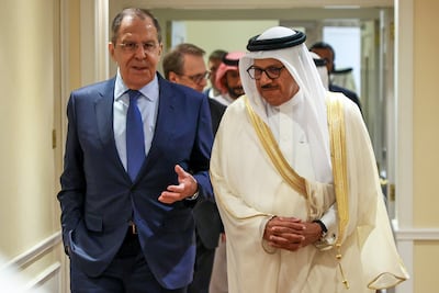 Russian Foreign Minister Sergey Lavrov, left, and Bahrain's Foreign Minister Abdullatif Al Zayani talk as they enter a hall for their meeting in Manama. Photo: AP