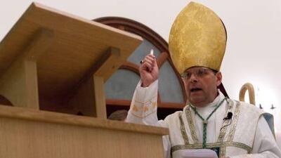 The Right Reverend Michael Lewis, Anglican Bishop of Cyprus and the Gulf, blesses the new burial ground and crematoriam at St Thomas' Church in Al Ain.