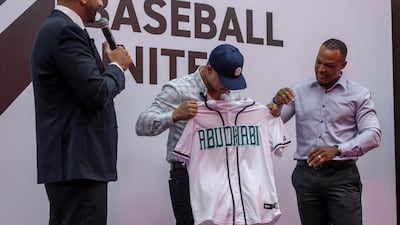 New York Yankees World Series champion Nick Swisher, centre, with former MLB star Adrian Beltre, right, and Baseball United’s chief executive Kash Shaikh, left.