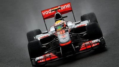 Lewis Hamilton of Great Britain and McLaren Mercedes drives during qualifying for the Brazilian Formula One.