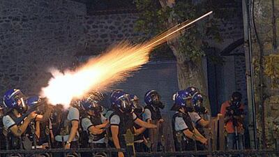 Riot police fire tear gas at protesters near the former Ottoman palace, Dolmabahce, where Turkey's Prime Minister Recep Tayyip Erdogan maintains an office in Istanbul. AP Photo
