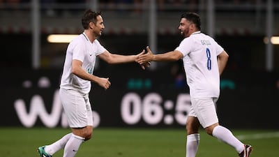 Frank Lampard celebrates with Gennaro Gattuso. Marco Bertorello / AFP