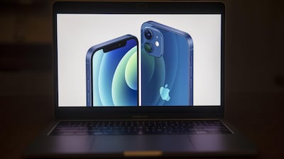 The Apple iPhone 12 is unveiled during a virtual product launch seen on a laptop computer in Tiskilwa, Illinois, US. Bloomberg