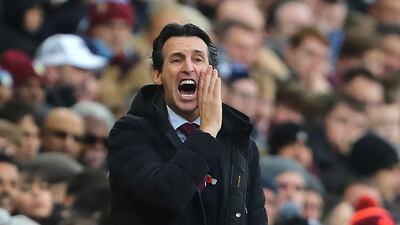 Aston Villa's new coach Unai Emery gestures on the touchline. AFP