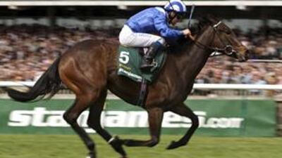 The Sheikh Hamdan bin Rashid-owned Ghanaati, ridden by Richard Hills, won the 1,000 Guineas at Newmarket in her first outing on turf and just her third start.