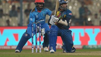 Sri Lanka's Tillakaratne Dilshan plays a shot during the World T20 cricket tournament match between Afghanistan and Sri Lanka at the Eden Gardens in Kolkata on March 17, 2016. / AFP / Dibyangshu SARKAR