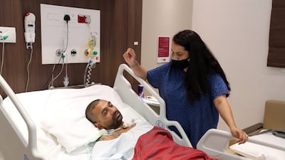 Nihal Hingst with his wife Candida Karthikeyan are facing a Dh1.3m medical bill after Nihal had a motorcycle accident. Pawan Singh/The National