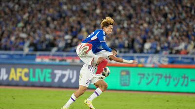 Yokohama F Marinos' Taiki Watanabe and Al Ain's Soufiane Rahimi battle. AP