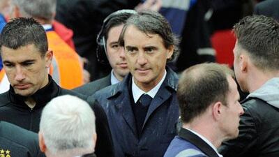 Roberto Mancini was brought in by Manchester City in December 2009. Andy Rain / EPA