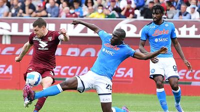 Kalidou Koulibaly tackles Andrea Belotti during the Serie A match between Torino and Napoli. EPA