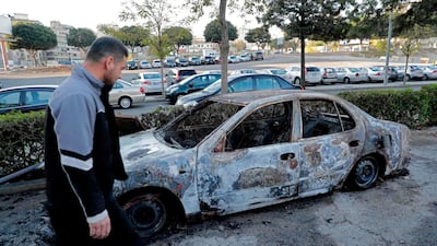 Destroyed cars are pictured in central Beirut on December 18, 2019. AFP