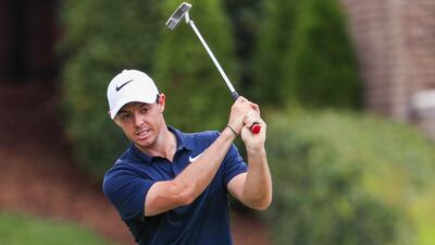 Rory McIlroy of Northern Ireland reacts as he misses a putt on the seventh green. Tannen Maury / EPA