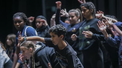 Lead dancer Saif Al Owais, 12, forefront, works on choreography with his fellow Cranleigh pupils. Mona Al Marzooqi / The National