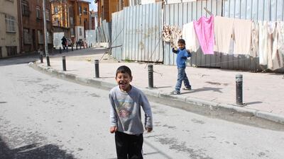 Vurgun and Polat play in the gentrified streets of Sulukule in Istanbul, where old Romany houses have been replaced by new condos. Courtesy Justin Salhani