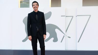 Italian singer Diodato walks the red carpet ahead of the Opening Ceremony during the 77th Venice Film Festival on September 2, 2020 in Venice, Italy. EPA