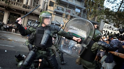 Demonstrators clash with police as lawmakers debate Argentinian President Javier Milei's economic reform bill, outside the National Congress in Buenos Aires. Reuters