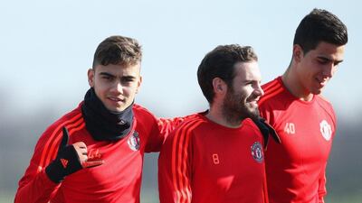 MANCHESTER, ENGLAND - FEBRUARY 24: (L-R) Andreas Pereira, Juan Mata and Joel Castro Pereira look on during a Manchester United training session ahead of their UEFA Europa League round of 32 second leg match against FC Midtjylland at the Aon Training Complex on February 24, 2016 in Manchester, United Kingdom. (Photo by Jan Kruger/Getty Images)