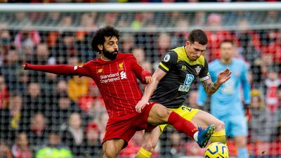 Liverpool's Mohamed Salah fights for the ball with Southampton's Pierre-Emile Hojbjerg. EPA