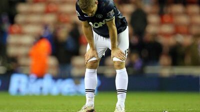 Nemanja Vidic and Manchester United have lost three straight matches for the first time in 11 years after losing 2-1 to Sunderland on Tuesday. Ian MacNicol / AFP