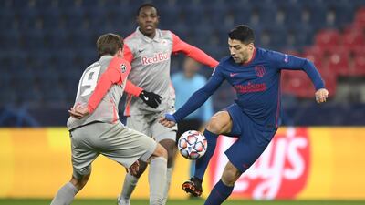 Atletico Madrid's Luis Suarez controls the ball during his team's 2-0 Champions League win over Red Bull Salzburg on Wednesday, December 9. EPA