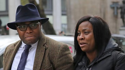 Isaiah Haastrup's mother Takesha Thomas and father Lanre Haastrup outside the High Court in London. Philip Toscano/PA