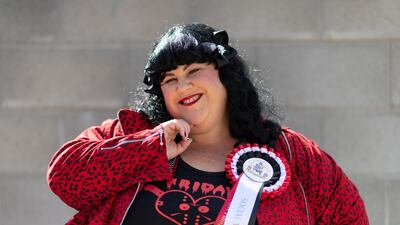 An Elvis fan poses for a photo in Parkes, Australia. Getty Images