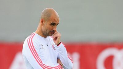 Pep Guardiola manager of Bayern Munich looks thoughtful during a FC Bayern Munich training session ahead of their Uefa Champions League semi-final second leg match against Atletico Madrid at the Sabener Strasse training ground on May 2, 2016 in Munich, Germany. (Photo by Alexander Hassenstein/Bongarts/Getty Images)