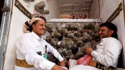 Yemeni vendors chew on khat as they display khat for sale at a market in Sanaa, Yemen. EPA