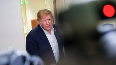 US President Donald Trump has posted on Truth Social about the positives of artificial intelligence and how critics are part of a conspiracy. Getty Images