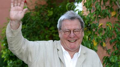 British director and president of the jury Sir Alan Parker smiles during the opening of the 4th Marrakesh International Film Festival on December 6, 2004 in Marrakesh. Reuters