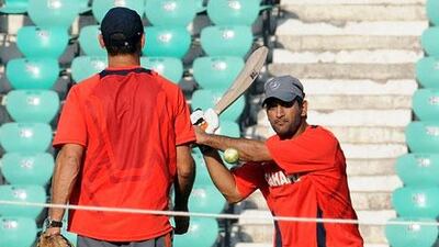 MS Dhoni, the India captain, right, is yet to see his team deliver a comprehensive all-round performance despite not losing a game. Prakash Singh / AFP