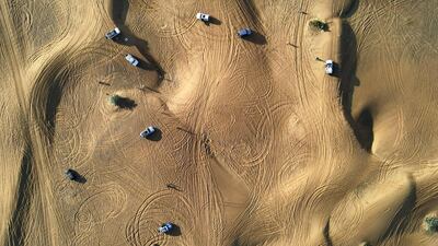 A convoy of 23 vehicles scoured five square kilometres of desert during their clean up.