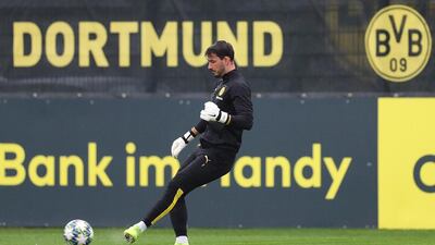 Dortmund goalkeeper Roman Buerki passes the ball. EPA