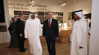 US President George W Bush attends a walk around presentation on Saadiyat Island Cultural District Exhibition led by Sheikh Mohammed bin Zayed, left, and Sheikh Sultan bin Tahnoun, Head of Abu Dhabi Tourism Authority. Philip Cheung / Abu Dhabi Media Company / January 14, 2008