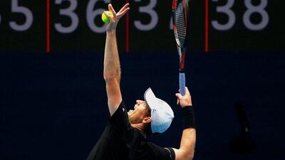 Andy Murray serves during a training session on Rod Laver Arena. David Gray / Reuters